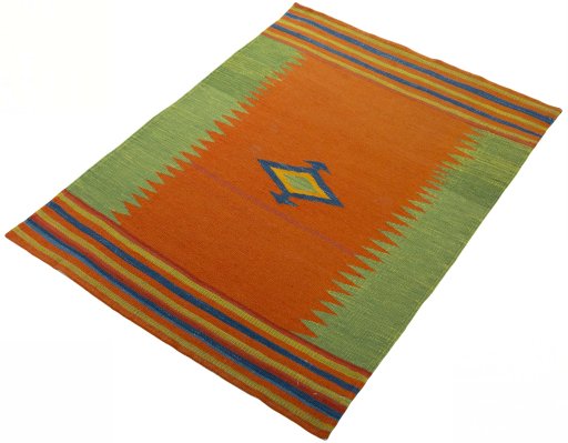Corner detail of New Kilim Sofre rug showing border pattern and Wool pile