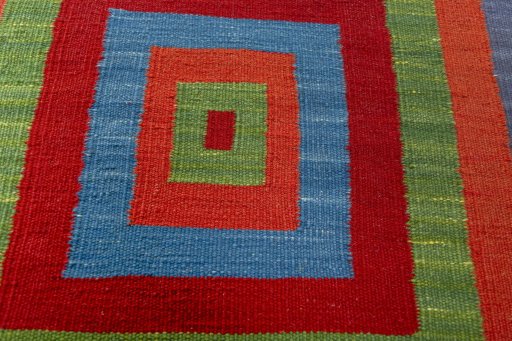 Backside of handmade New Kilim Sofre rug showing knot structure and weave density