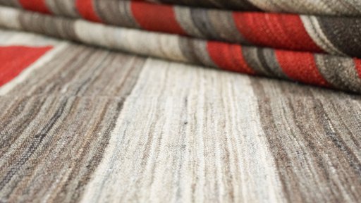 Close-up detail of New Modern Design rug from Iran / Persia showing Wool weave