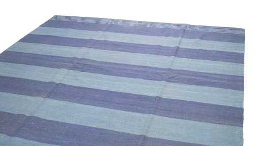 Surface texture of 1990s Modern Design rug with natural Wool and intricate pattern