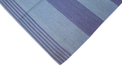 Backside of handmade 1990s Modern Design rug showing knot structure and weave density