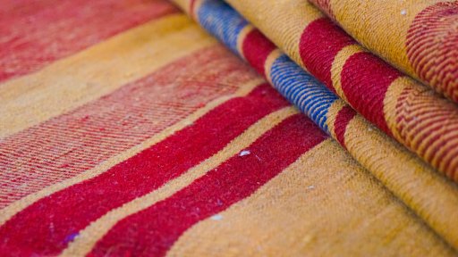 Close-up detail of New Modern Design rug from Iran / Persia showing Wool weave