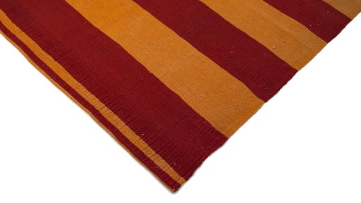 Backside of handmade New Modern Design rug showing knot structure and weave density