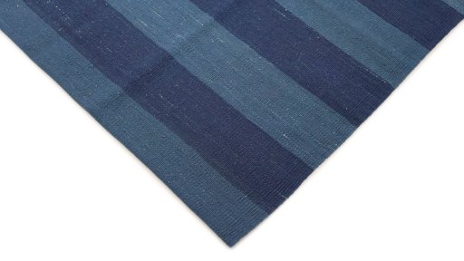 Backside of handmade New Modern Design rug showing knot structure and weave density