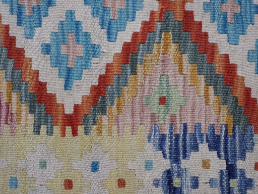 Backside of handmade New Modern Design rug showing knot structure and weave density