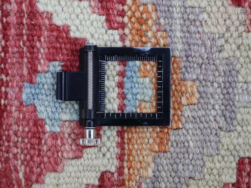 Corner detail of New Modern Design rug showing border pattern and Wool pile