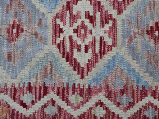 Backside of handmade New Modern Design rug showing knot structure and weave density