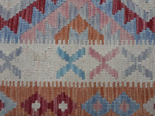 Backside of handmade New Modern Design rug showing knot structure and weave density