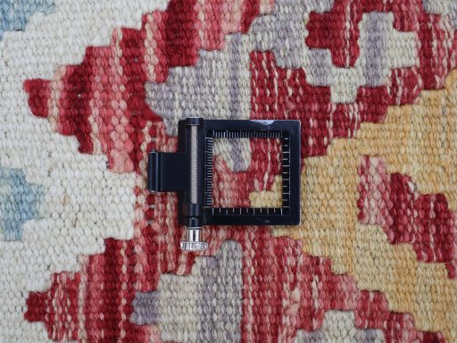 Corner detail of New Modern Design rug showing border pattern and Wool pile