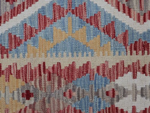 Backside of handmade New Modern Design rug showing knot structure and weave density