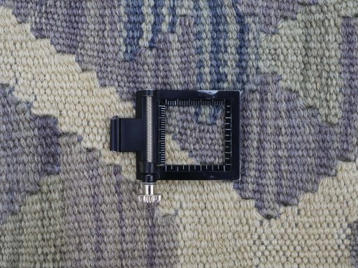 Corner detail of New Modern Design rug showing border pattern and Wool pile