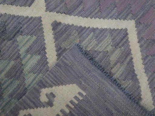 Surface texture of New Modern Design rug with natural Wool and intricate pattern