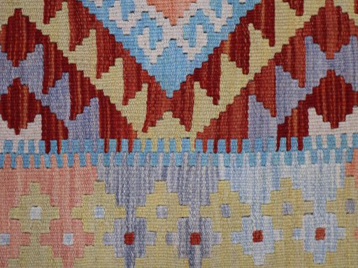 Backside of handmade New Modern Design rug showing knot structure and weave density