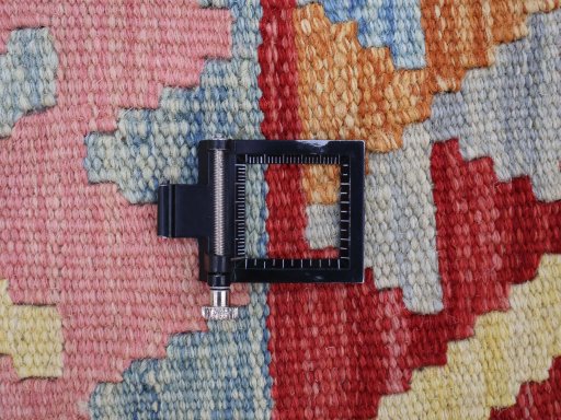 Corner detail of New Modern Design rug showing border pattern and Wool pile