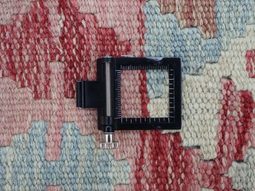 Corner detail of New Modern Design rug showing border pattern and Wool pile