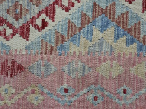 Backside of handmade New Modern Design rug showing knot structure and weave density
