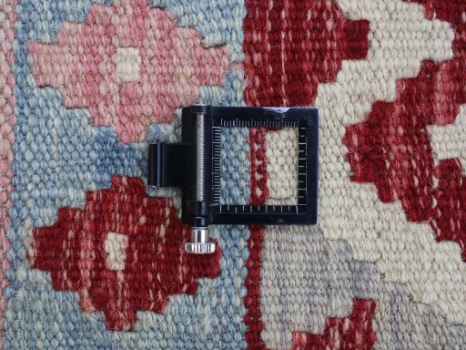 Corner detail of New Modern Design rug showing border pattern and Wool pile
