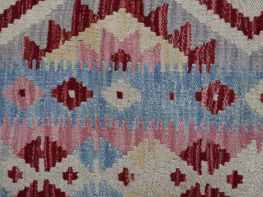 Backside of handmade New Modern Design rug showing knot structure and weave density