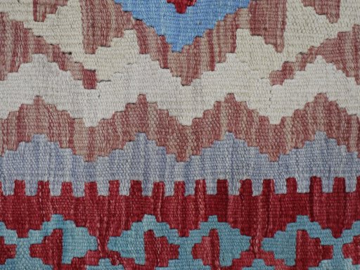 Backside of handmade New Modern Design rug showing knot structure and weave density