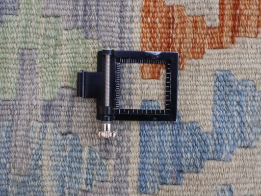 Corner detail of New Modern Design rug showing border pattern and Wool pile