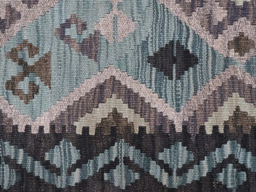 Backside of handmade New Modern Design rug showing knot structure and weave density