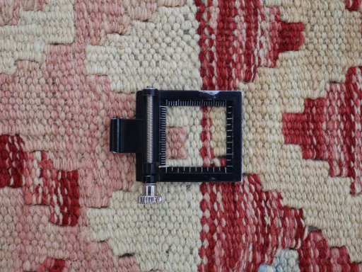 Corner detail of New Modern Design rug showing border pattern and Wool pile