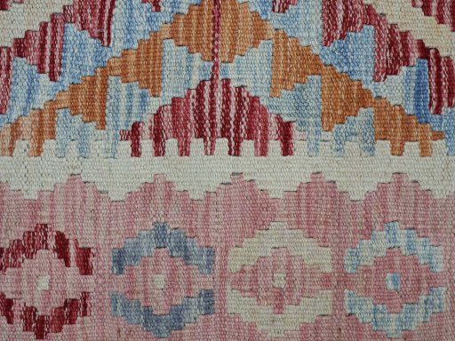 Backside of handmade New Modern Design rug showing knot structure and weave density
