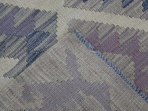 Surface texture of New Modern Design rug with natural Wool and intricate pattern