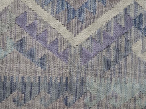 Backside of handmade New Modern Design rug showing knot structure and weave density