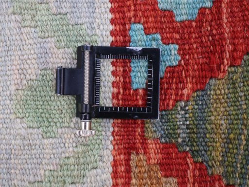 Corner detail of New Modern Design rug showing border pattern and Wool pile