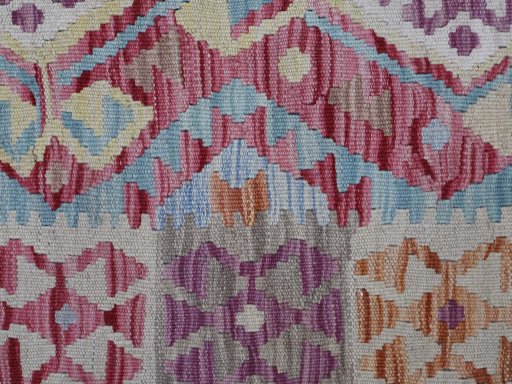 Backside of handmade New Modern Design rug showing knot structure and weave density