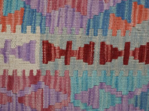Backside of handmade New Modern Design rug showing knot structure and weave density