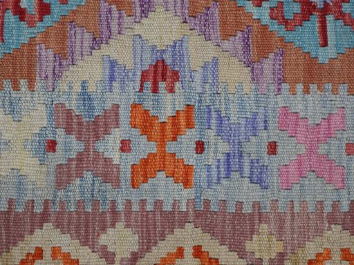 Backside of handmade New Modern Design rug showing knot structure and weave density