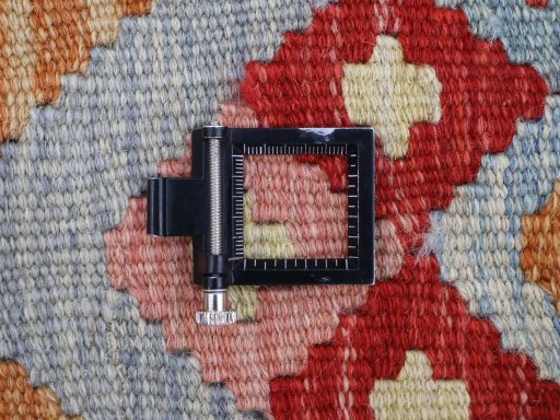Corner detail of New Modern Design rug showing border pattern and Wool pile