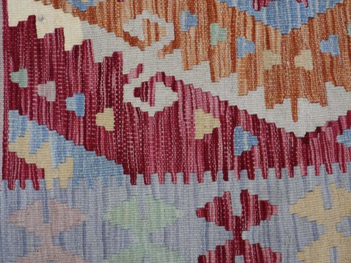 Backside of handmade New Modern Design rug showing knot structure and weave density
