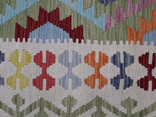 Backside of handmade New Modern Design rug showing knot structure and weave density