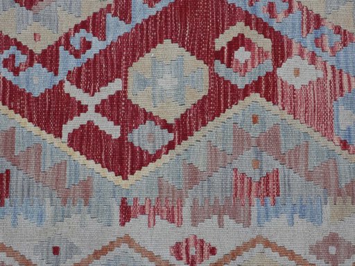 Backside of handmade New Modern Design rug showing knot structure and weave density