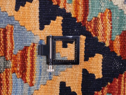 Corner detail of New Modern Design rug showing border pattern and Wool pile
