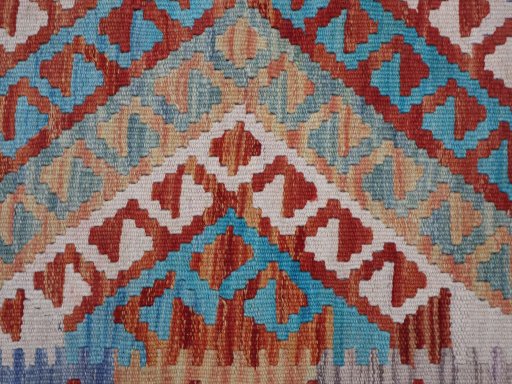 Backside of handmade New Modern Design rug showing knot structure and weave density