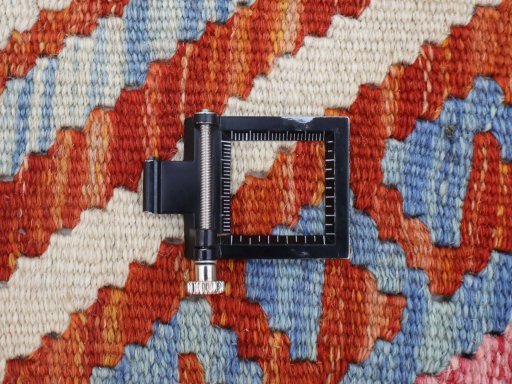 Corner detail of New Modern Design rug showing border pattern and Wool pile