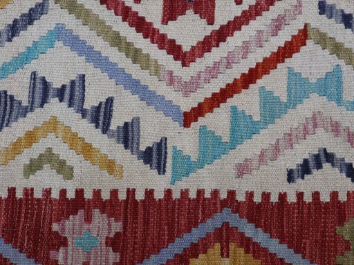 Backside of handmade New Modern Design rug showing knot structure and weave density
