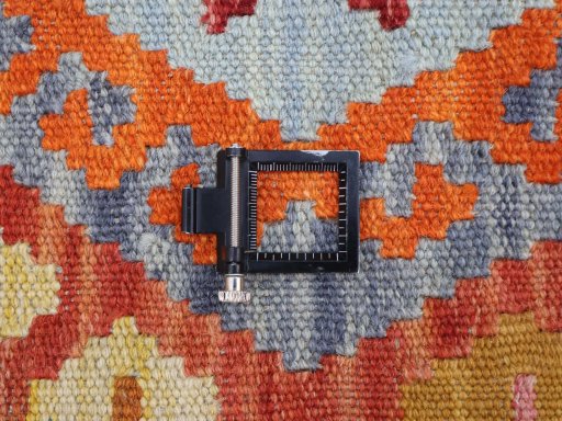 Corner detail of New Modern Design rug showing border pattern and Wool pile
