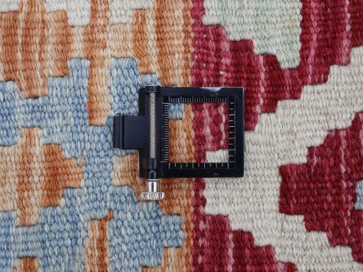 Corner detail of New Modern Design rug showing border pattern and Wool pile