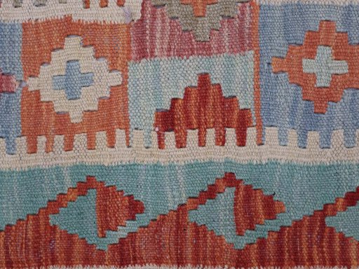 Backside of handmade New Modern Design rug showing knot structure and weave density