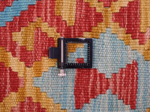 Corner detail of New Modern Design rug showing border pattern and Wool pile