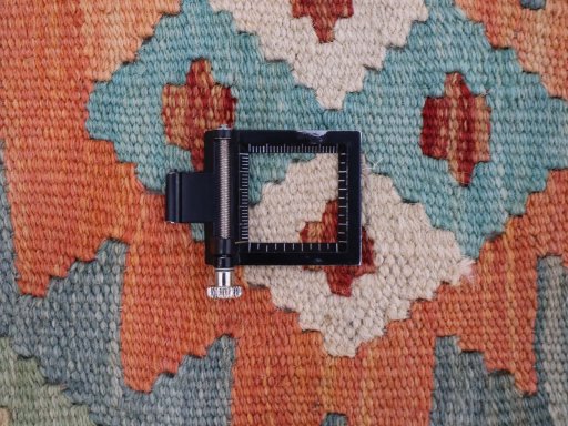 Corner detail of New Modern Design rug showing border pattern and Wool pile