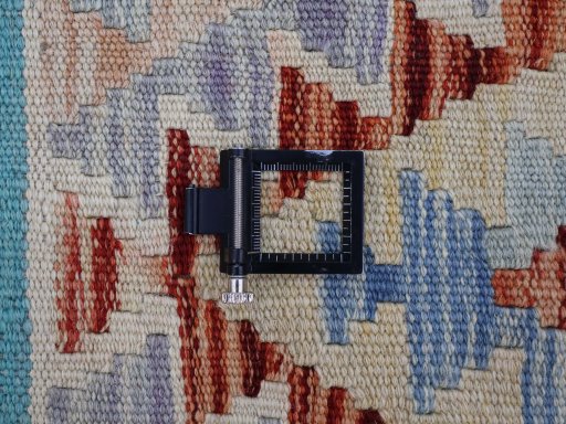 Corner detail of New Modern Design rug showing border pattern and Wool pile
