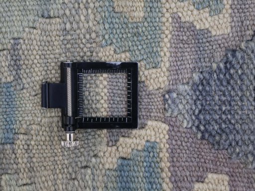 Corner detail of New Modern Design rug showing border pattern and Wool pile