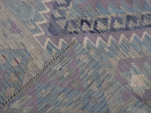 Surface texture of New Modern Design rug with natural Wool and intricate pattern