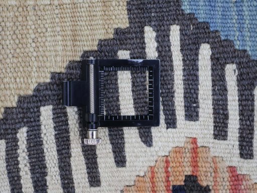 Corner detail of New Modern Design rug showing border pattern and Wool pile